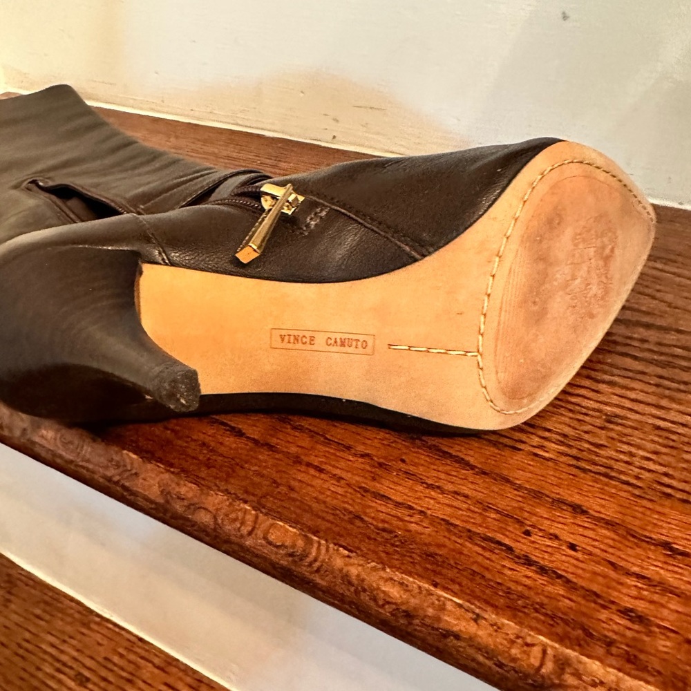 Like new Vince Camuto, brown, 3 inch heel boot.  In excellent condition